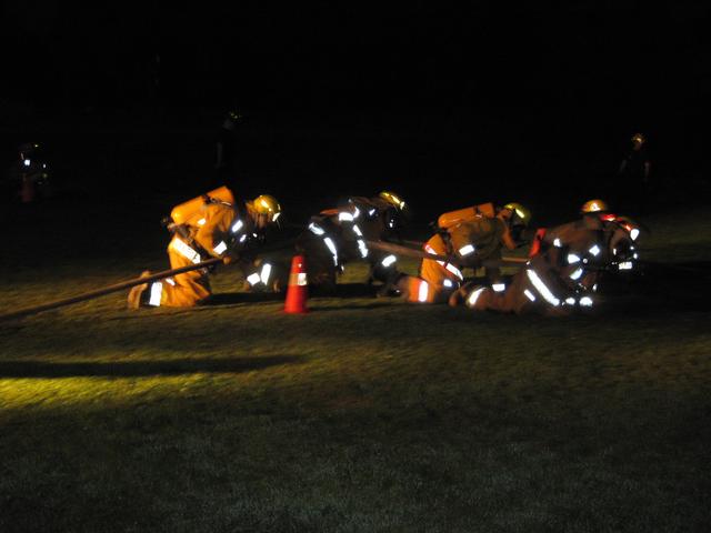 SLVFD members Craig Barry, Jim Stinson, Garret Krasher, Trevor Brier, and Lewis VFD member Mike Flynn negotiate cone drill in full PPE 8/11/2010